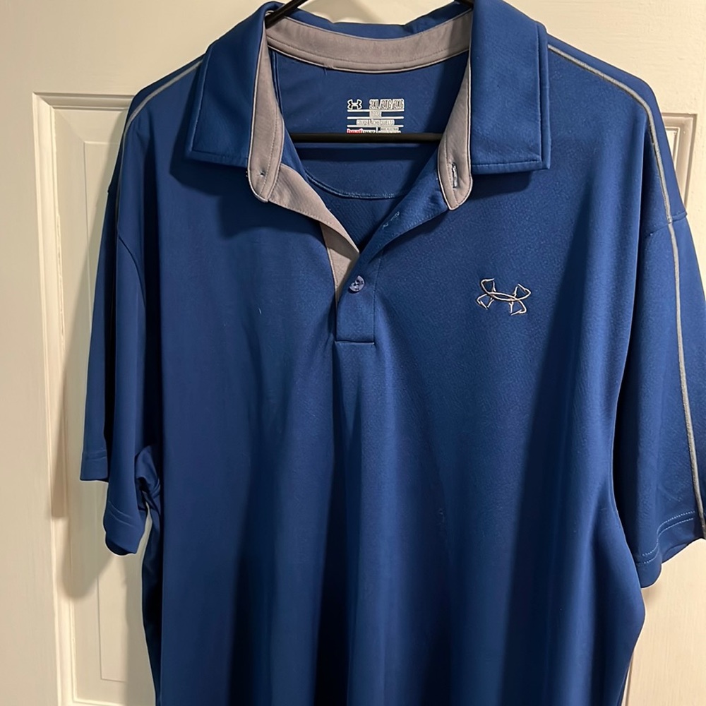Men’s XXL Under Armour blue performance polo. Fits true to size. New with tags